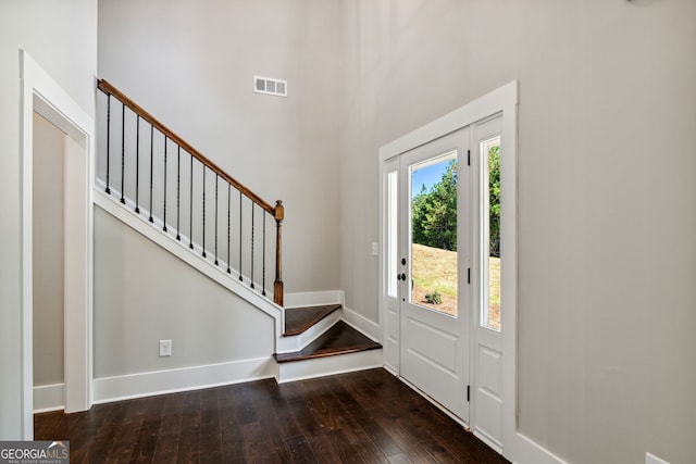 entrance foyer with dark hardwood / wood-style flooring