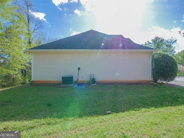 view of home's exterior featuring a yard