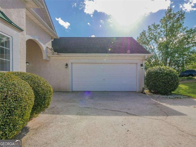 exterior space featuring a garage