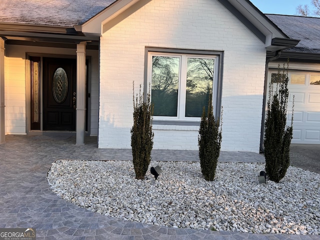 entrance to property with a garage