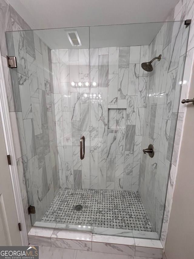 bathroom with walk in shower