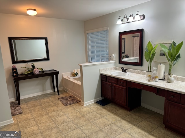 bathroom with a washtub and vanity