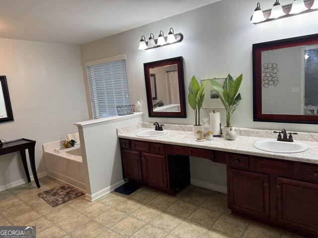 bathroom featuring a bathing tub and vanity