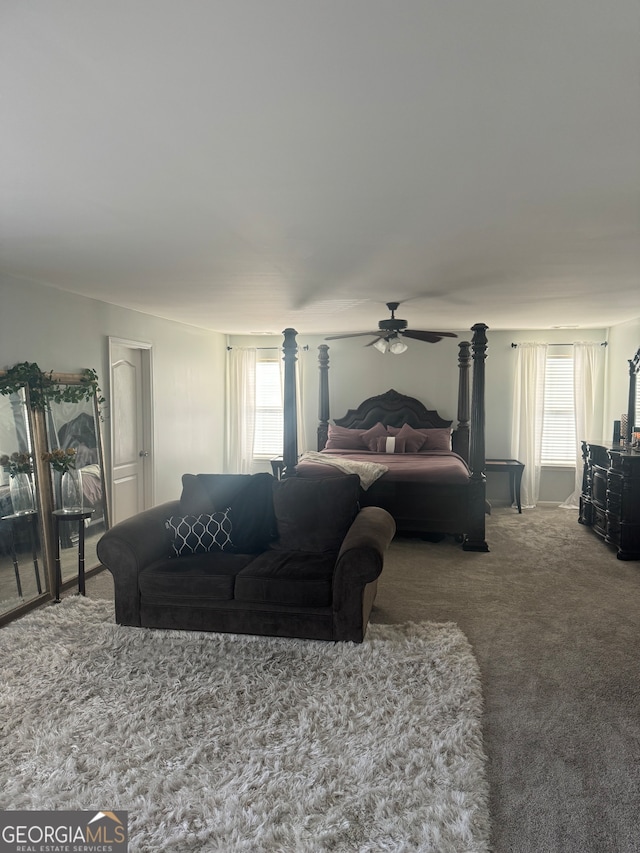 carpeted bedroom with ceiling fan