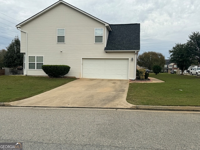 view of home's exterior with a yard and a garage