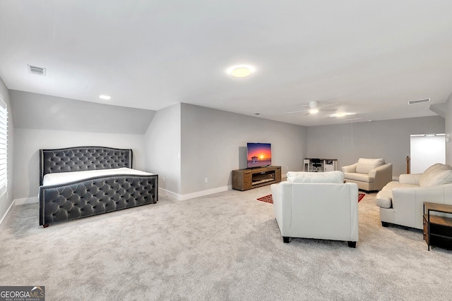 living room featuring light carpet, ceiling fan, and lofted ceiling