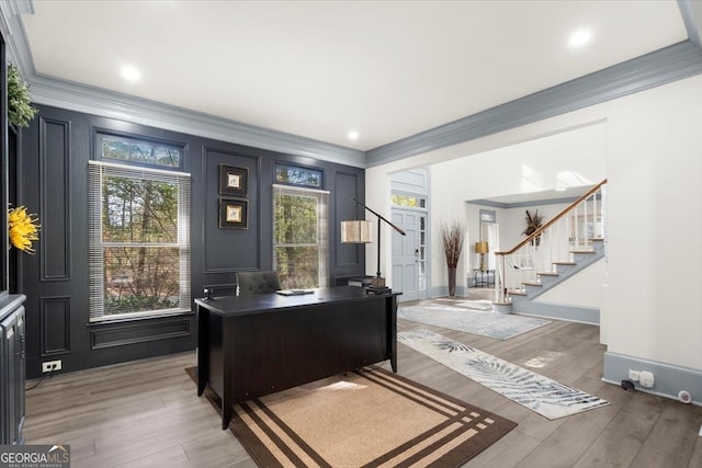 office area featuring crown molding and dark wood-type flooring