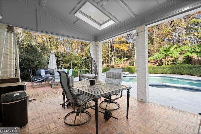 sunroom / solarium with lofted ceiling