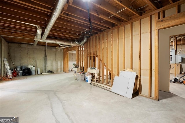 basement featuring electric panel