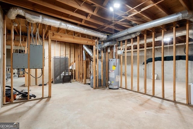 basement with heating unit and water heater