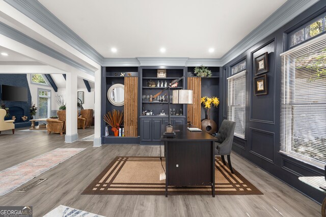 entryway with hardwood / wood-style flooring and a towering ceiling