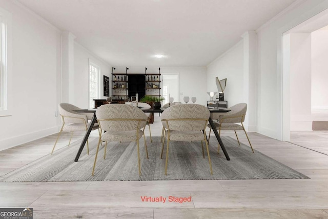 dining space featuring light hardwood / wood-style floors