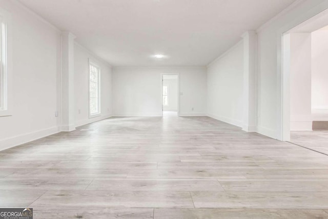 spare room featuring light hardwood / wood-style floors