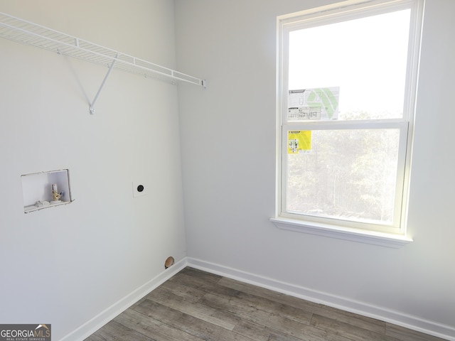 washroom with laundry area, baseboards, dark wood-style floors, washer hookup, and electric dryer hookup