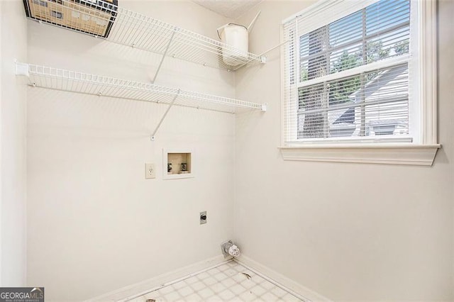 clothes washing area with hookup for a washing machine and hookup for an electric dryer