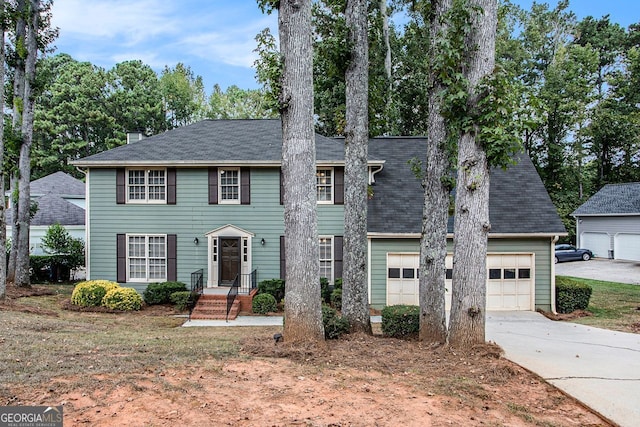 colonial-style house featuring a garage