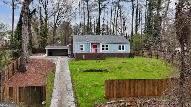 view of front of property with a shingled roof, a front lawn, a fenced backyard, crawl space, and driveway