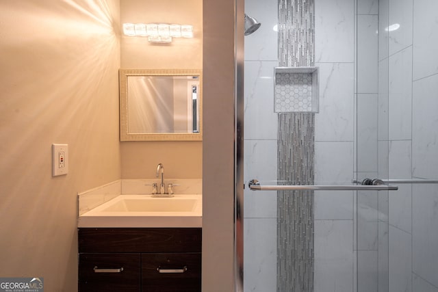 bathroom featuring vanity and a stall shower