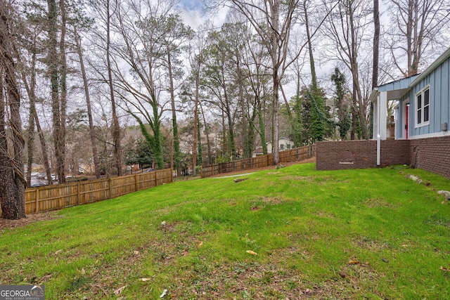 view of yard with fence