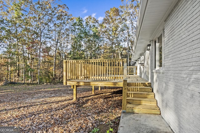 view of yard with a wooden deck