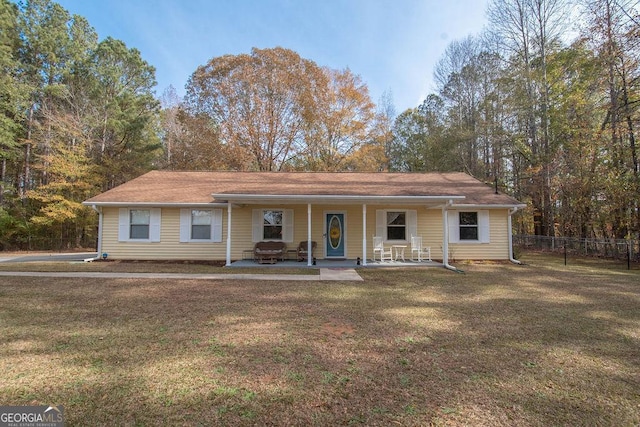 single story home featuring a patio and a front yard