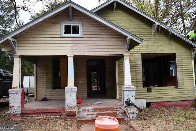 bungalow-style home featuring a porch