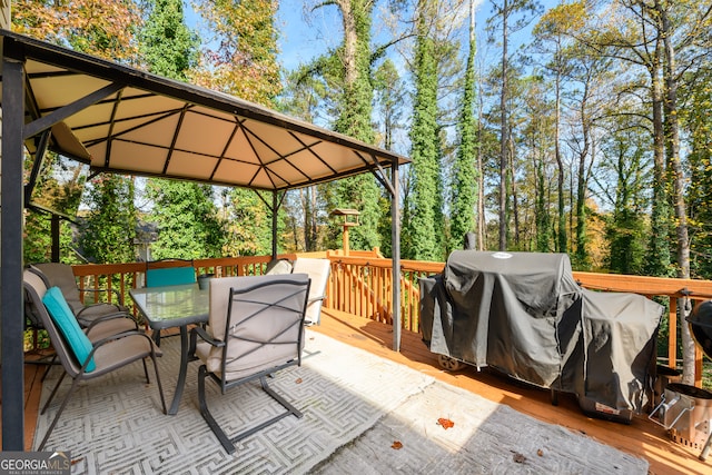 deck with a gazebo and grilling area