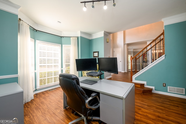 office space with dark hardwood / wood-style flooring and ornamental molding