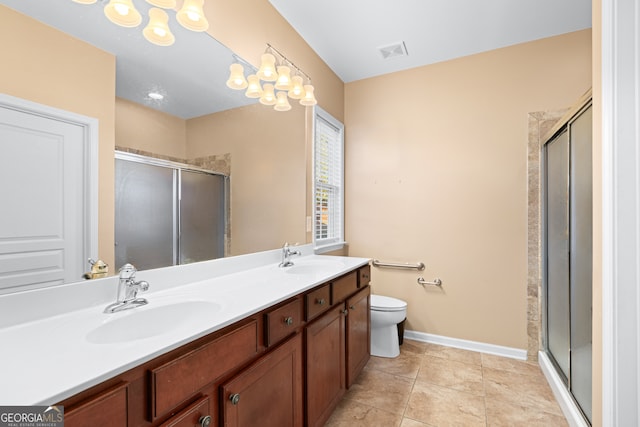 bathroom with a sink, visible vents, double vanity, and a shower stall