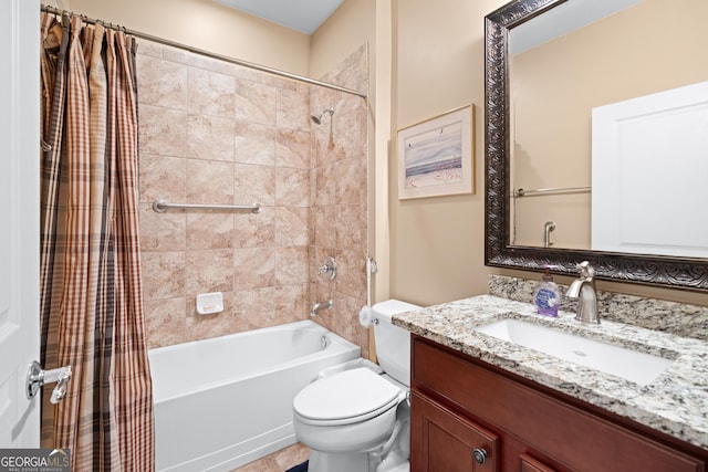 full bath with shower / tub combo with curtain, vanity, and toilet