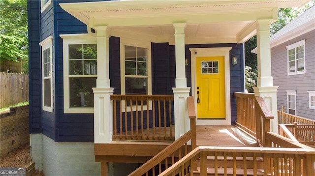 entrance to property with a porch