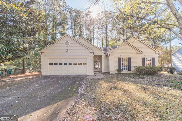 ranch-style home with a garage