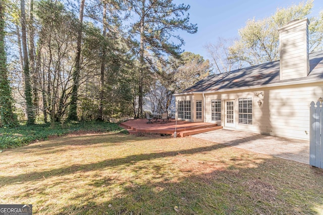 view of yard with a deck