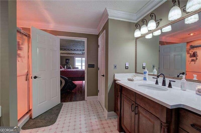 bathroom with vanity and ornamental molding