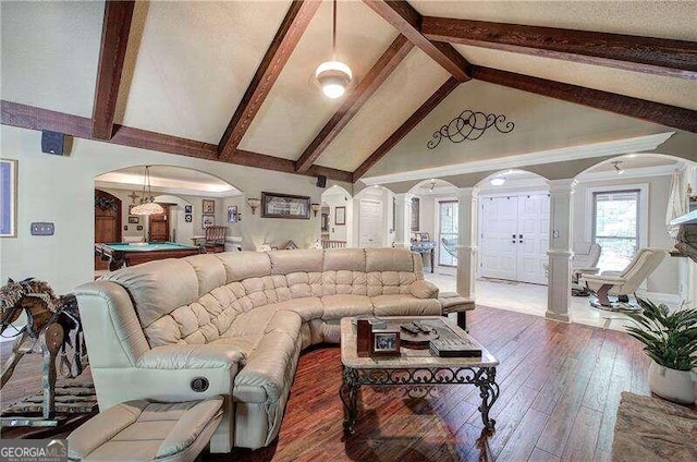 living room with ornate columns, wood-type flooring, high vaulted ceiling, beamed ceiling, and pool table