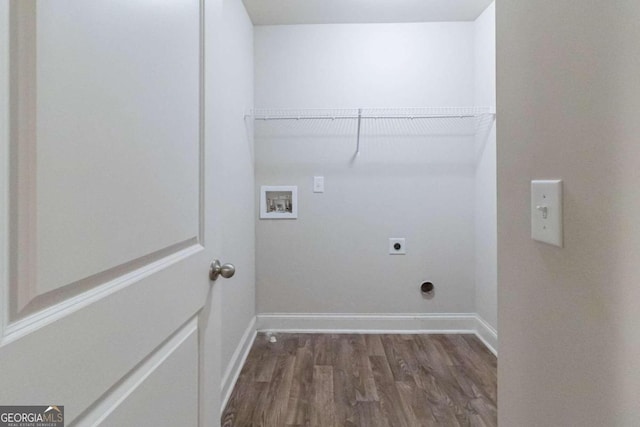 clothes washing area with hookup for an electric dryer, hookup for a washing machine, and dark hardwood / wood-style floors