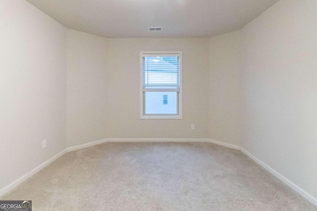 empty room featuring carpet flooring