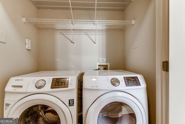 laundry area featuring washer and clothes dryer