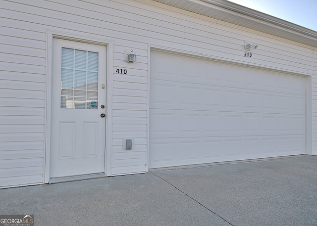 exterior space with a garage