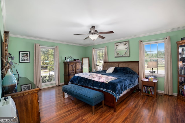 bedroom with ceiling fan, dark hardwood / wood-style floors, and multiple windows