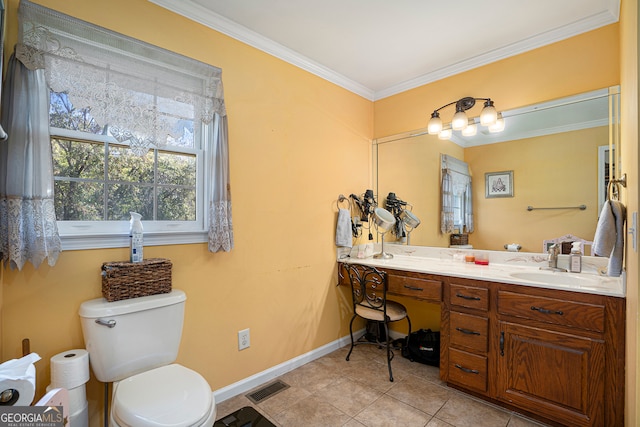 bathroom featuring tile patterned floors, vanity, toilet, and ornamental molding