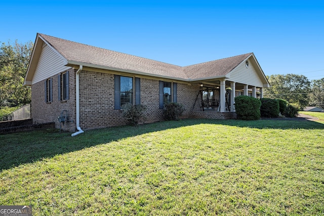 ranch-style house with a front yard