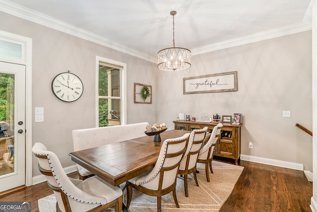 dining room with ornamental molding, dark wood-type flooring, and a wealth of natural light