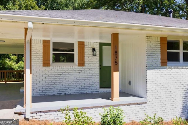 property entrance with a porch