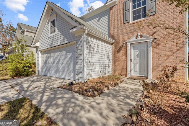 exterior space with a garage