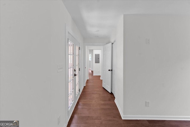 hall featuring dark wood-type flooring and french doors