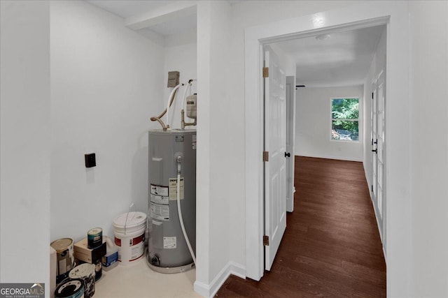 utility room with electric water heater