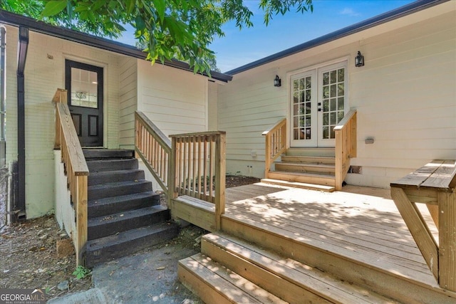 property entrance featuring french doors and a deck