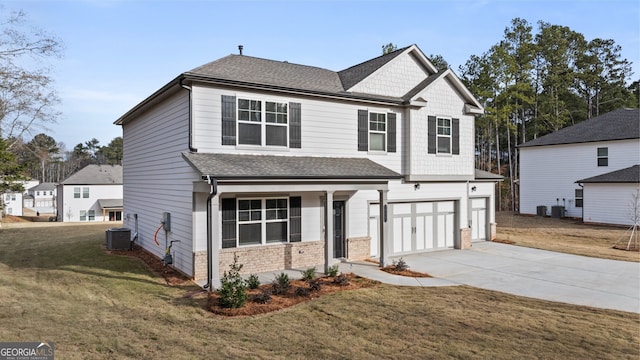 front of property with central AC, a garage, and a front lawn