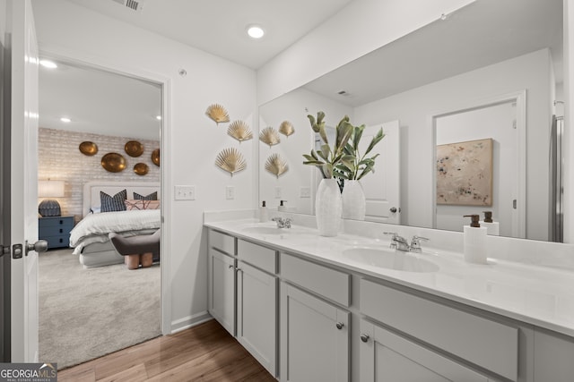 bathroom featuring vanity and hardwood / wood-style flooring